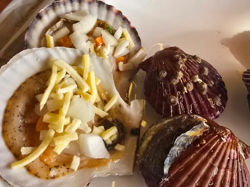 치즈가 듬뿍 올려진 가리비