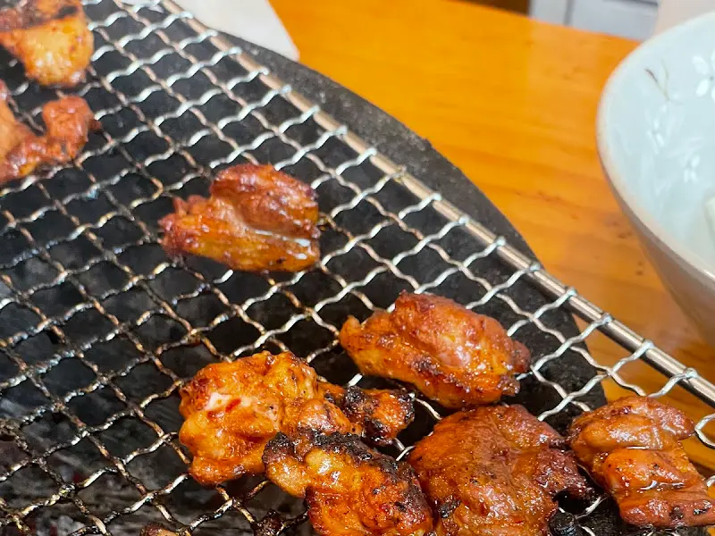 노릇하게 익은 양념 오리구이
