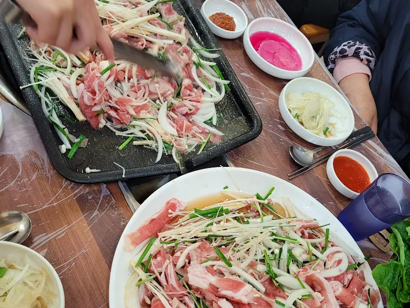 불판 위에서 익어가는 타짜오리