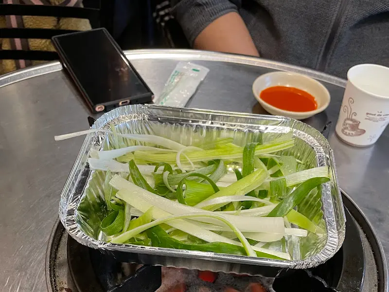 특제 소스에 담긴 대파