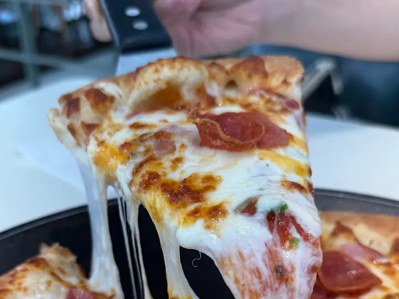 치즈가 쭈욱 늘어나는 피자