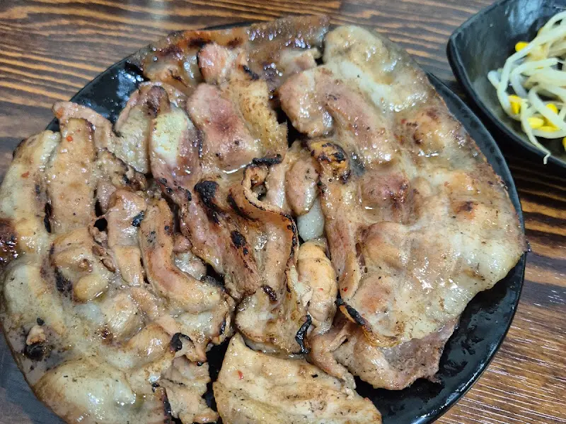 연탄불에 구워진 돼지불고기