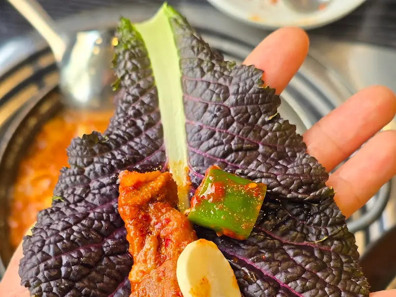 손바닥 위에 올려진 쌈